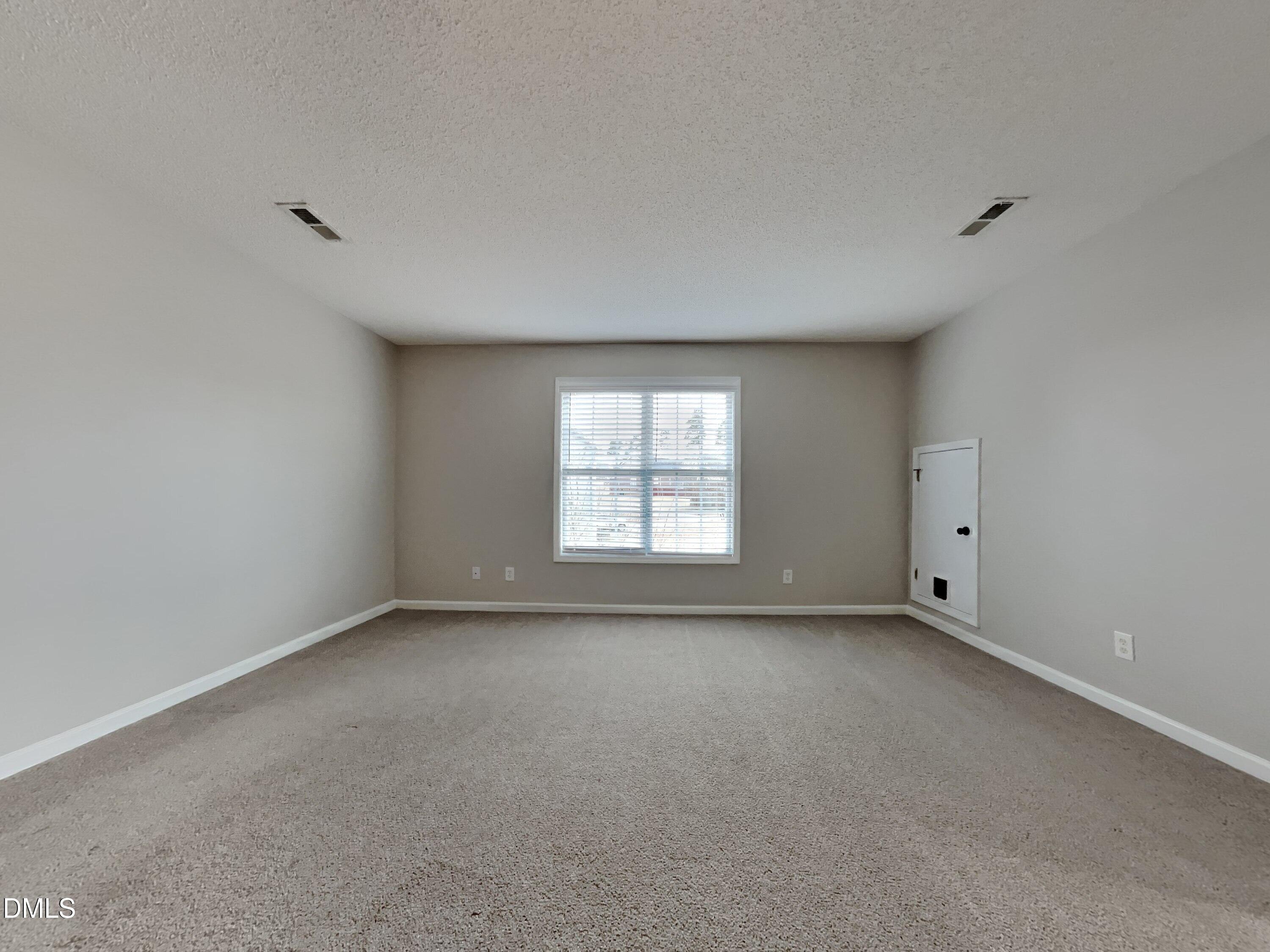 226 Linden Road Cameron, NC 28326 - Photo 19 of 20 a view of an empty room with a window