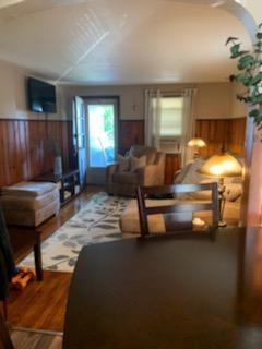 19 Charles Street Dravosburg, PA 15034 - Photo 3 of 18 a living room with furniture and a fireplace