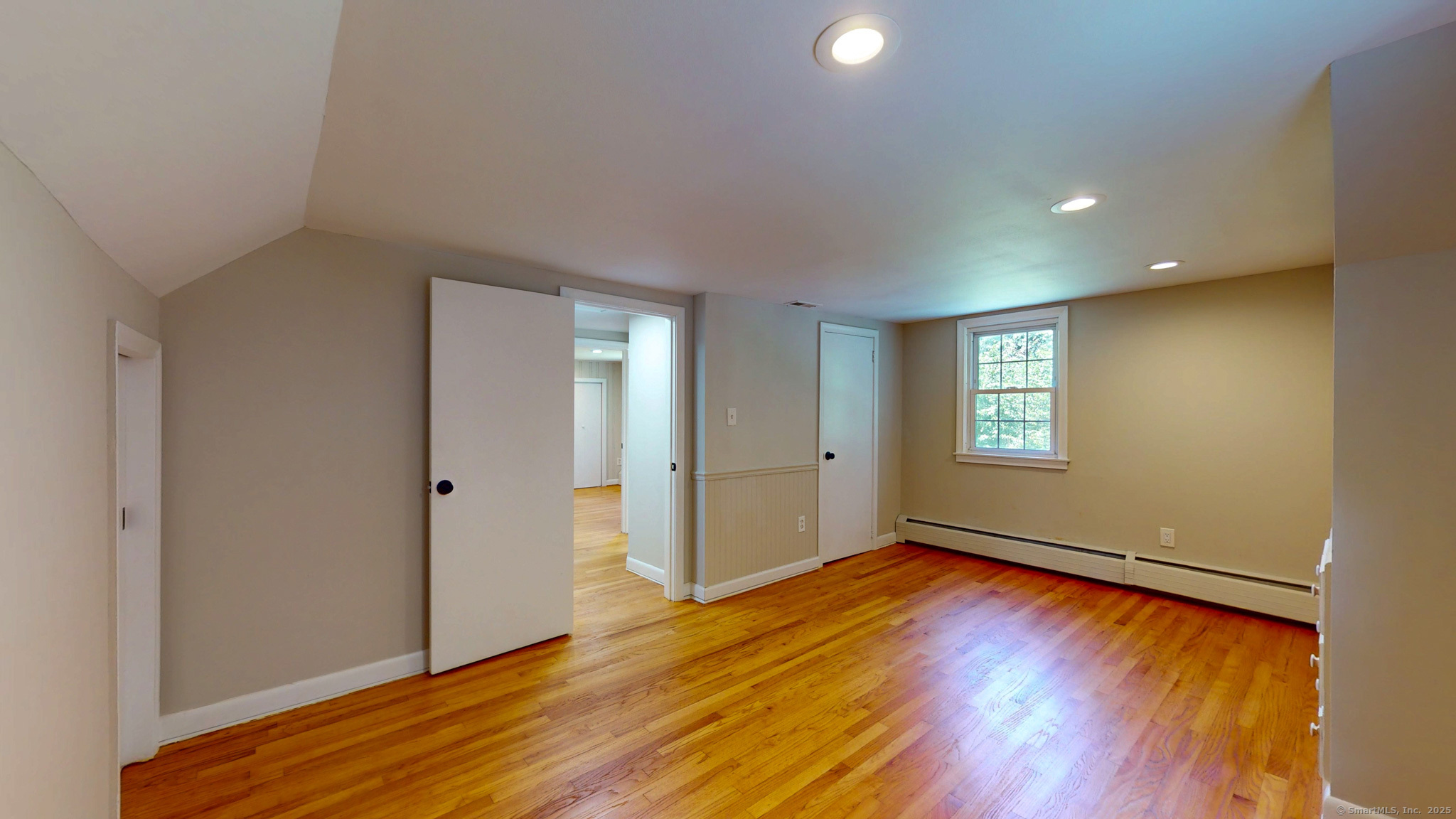 86 Gabb Road Bloomfield, CT 06002 - Photo 20 of 40 a view of room with window and wooden floor