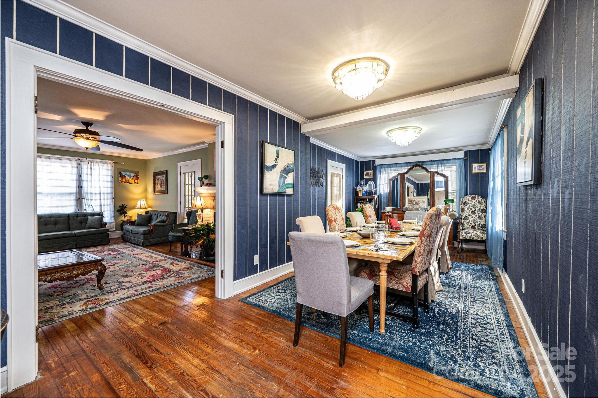 221 3rd Street Northeast Hickory, NC 28601 - Photo 22 of 40 a view of a dining room with furniture window and wooden floor