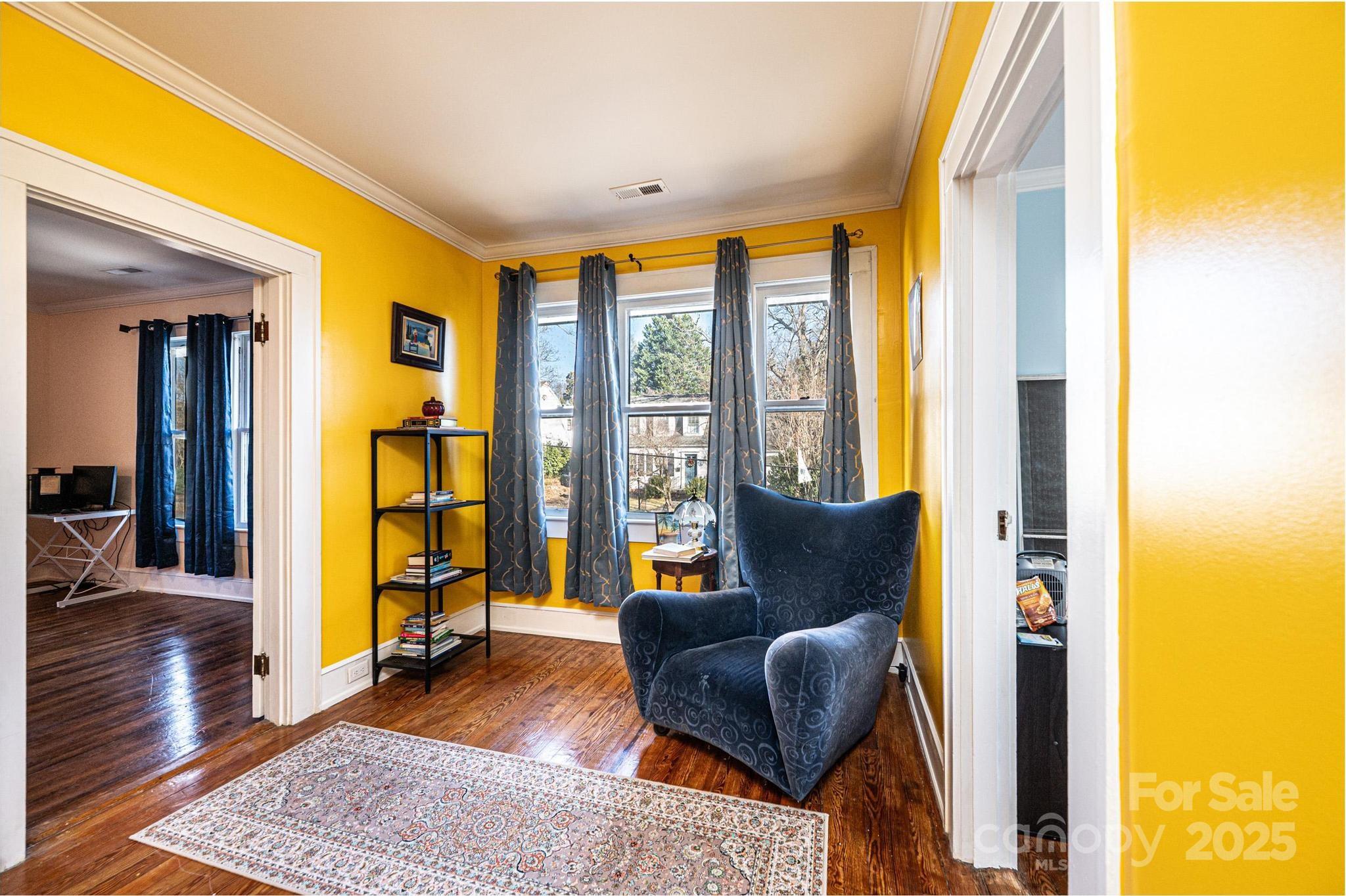 221 3rd Street Northeast Hickory, NC 28601 - Photo 28 of 40 a living room with furniture and a window