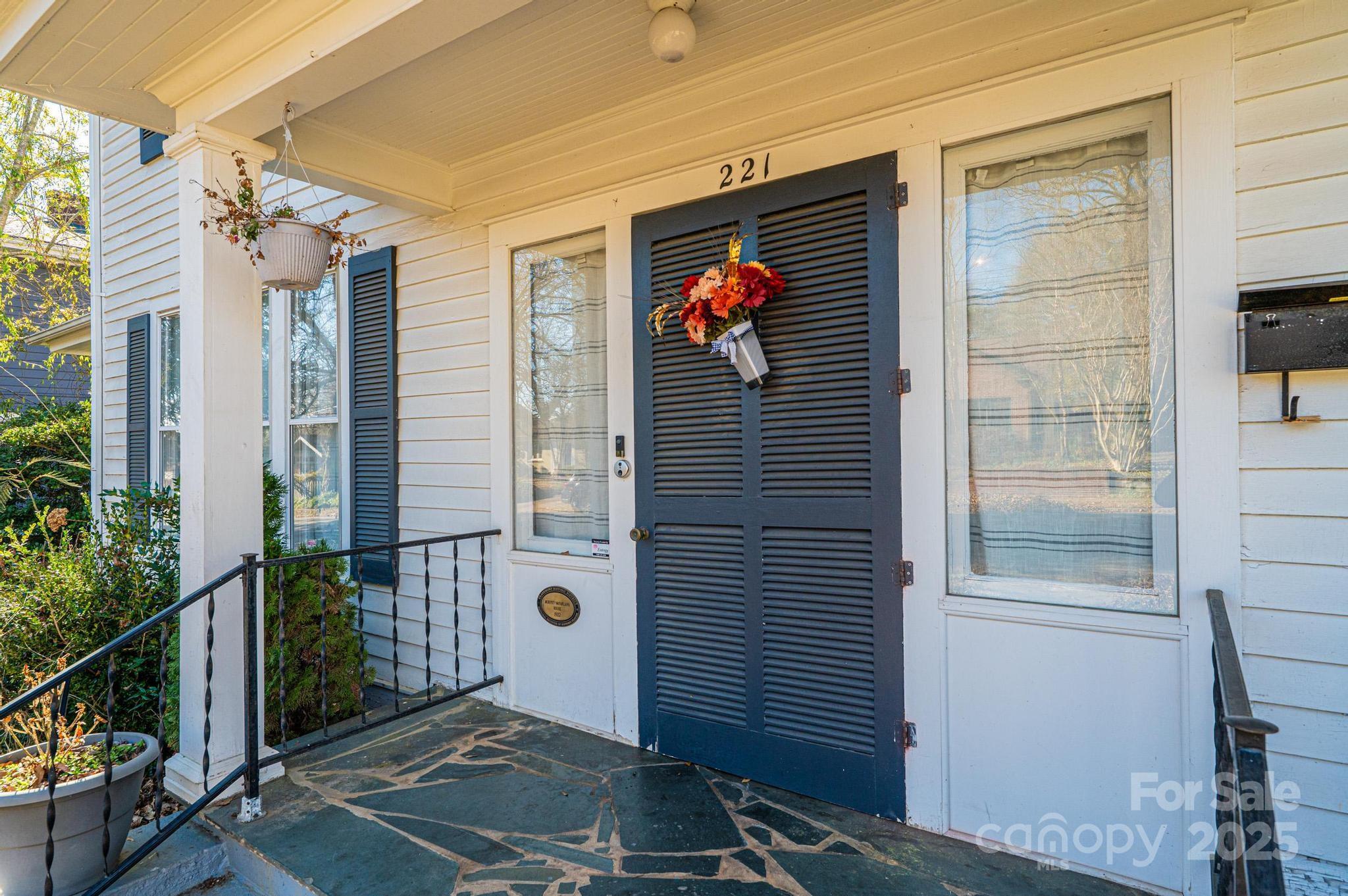 221 3rd Street Northeast Hickory, NC 28601 - Photo 3 of 40 a view of a door of a house