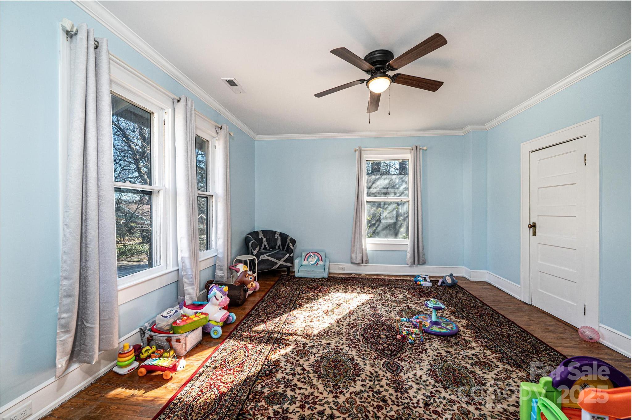 221 3rd Street Northeast Hickory, NC 28601 - Photo 34 of 40 a bed room with a bed and a window