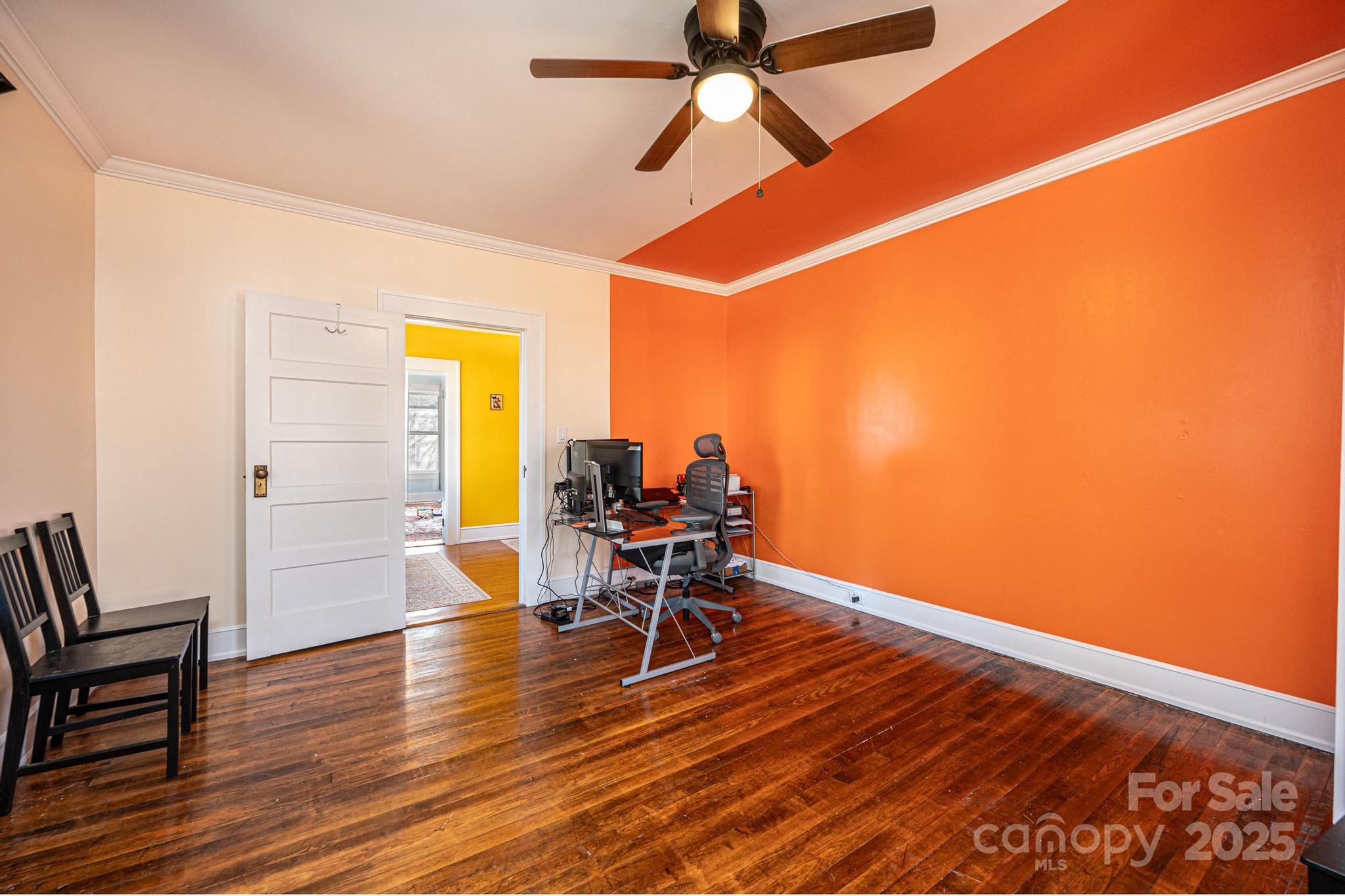 221 3rd Street Northeast Hickory, NC 28601 - Photo 37 of 40 a work room with furniture and wooden floor