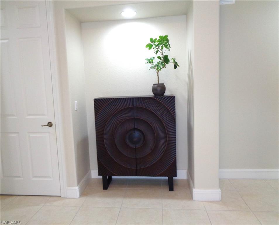 734 Regency Reserve Circle, Unit 2701 Naples, FL 34119 - Photo 3 of 37 a view of entryway with washer and dryer