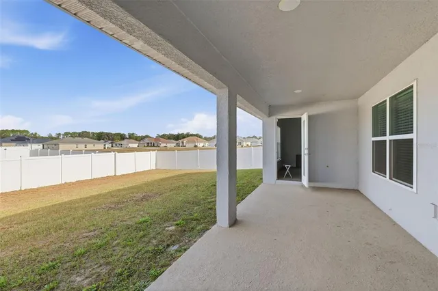 a view of a lake with a big yard