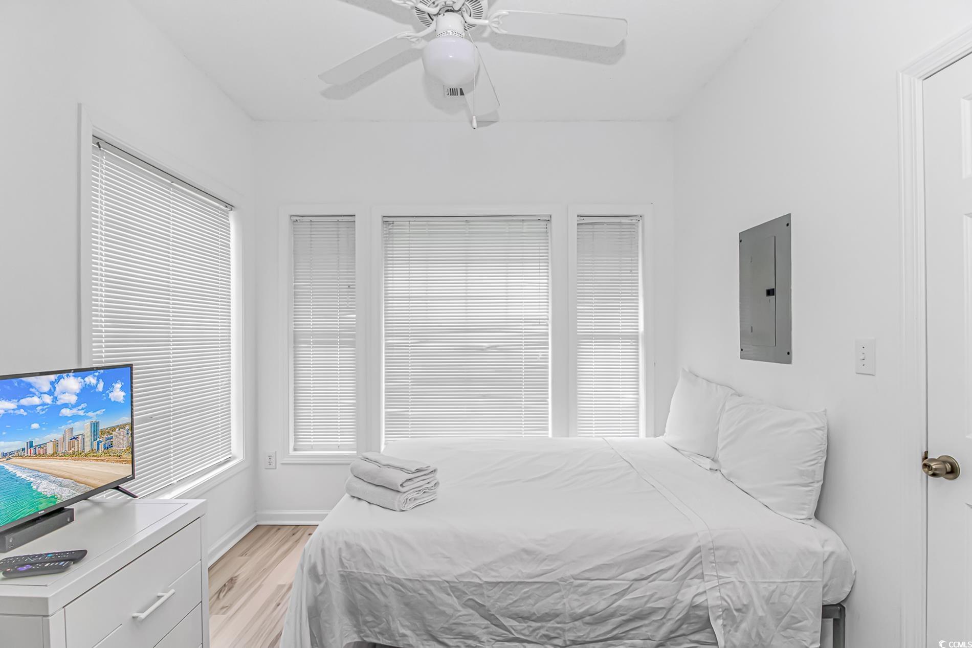 9754 Leyland Drive, Unit 9 Myrtle Beach, SC 29572 - Photo 19 of 40 Bedroom with light wood-style floors, electric pan