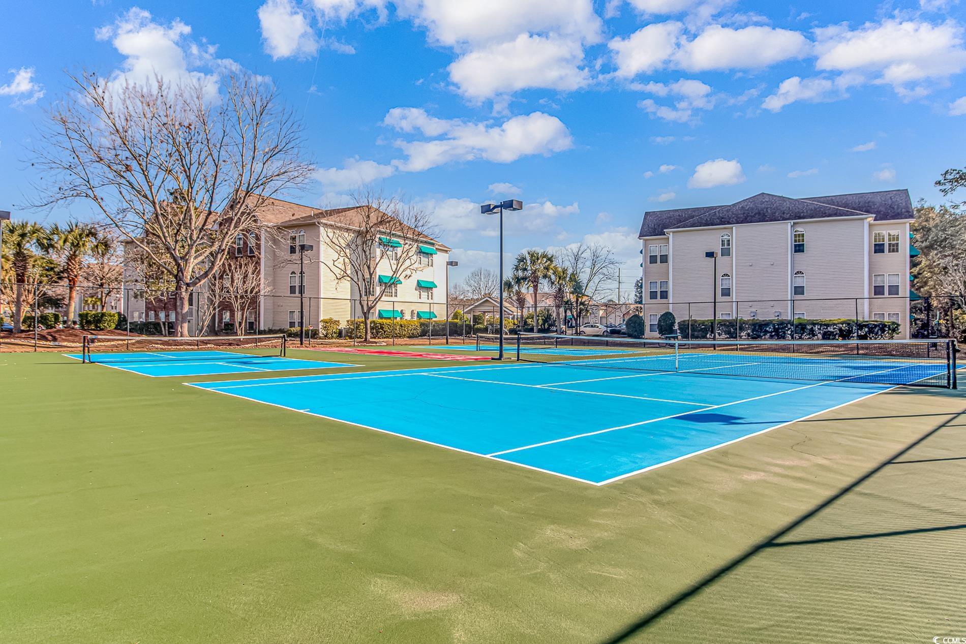9754 Leyland Drive, Unit 9 Myrtle Beach, SC 29572 - Photo 36 of 40 View of tennis court with community basketball cou
