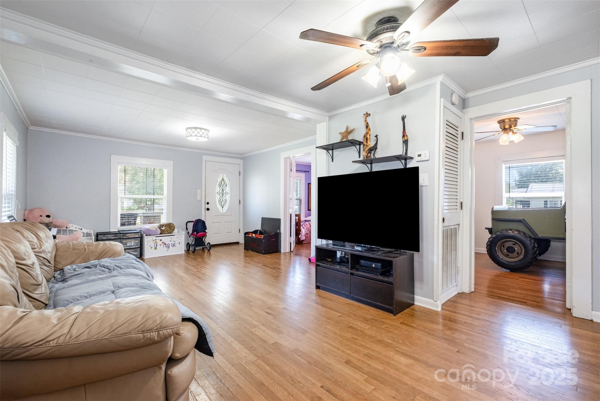 811 Cleveland Avenue Grover, NC 28073 - Photo 11 of 43 a living room with furniture and a flat screen tv