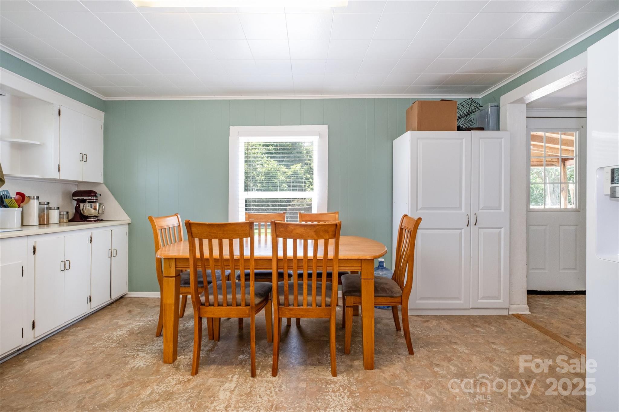 811 Cleveland Avenue Grover, NC 28073 - Photo 12 of 43 a view of a dining room with furniture and window