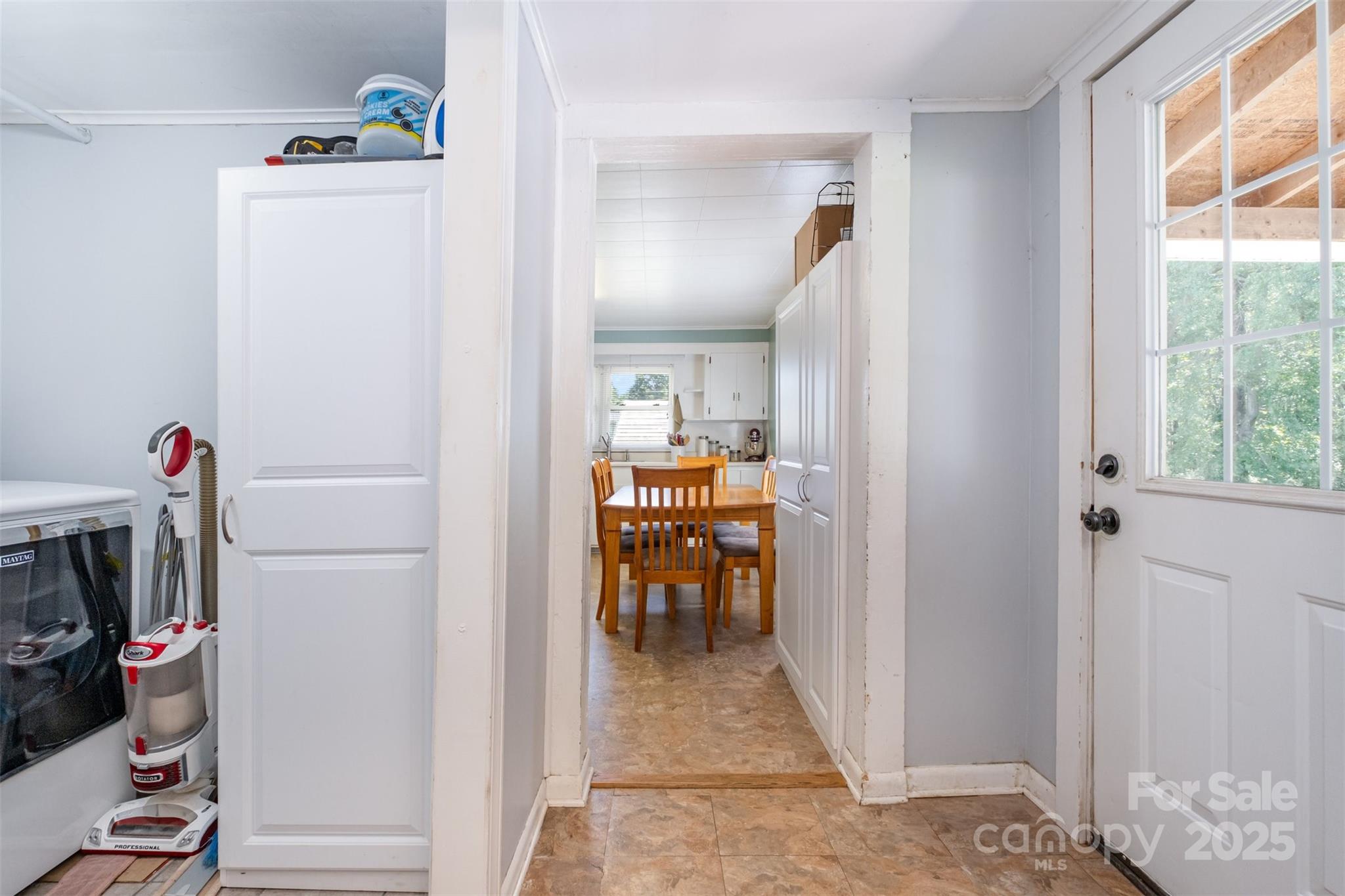 811 Cleveland Avenue Grover, NC 28073 - Photo 19 of 43 a view of walk in closet with clothes and shoes