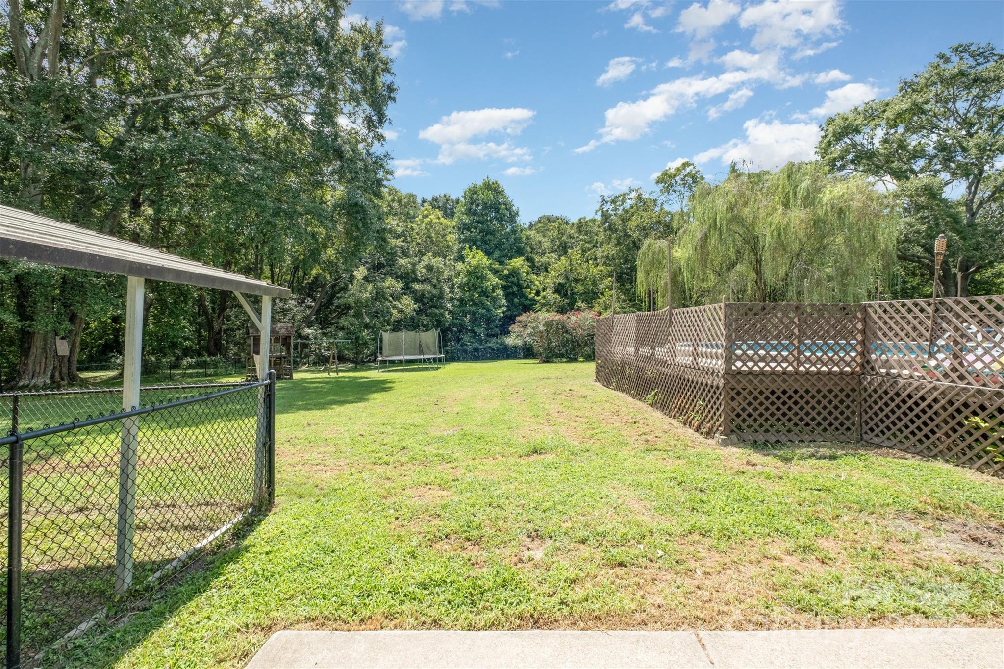 811 Cleveland Avenue Grover, NC 28073 - Photo 27 of 43 a view of a garden with a tree