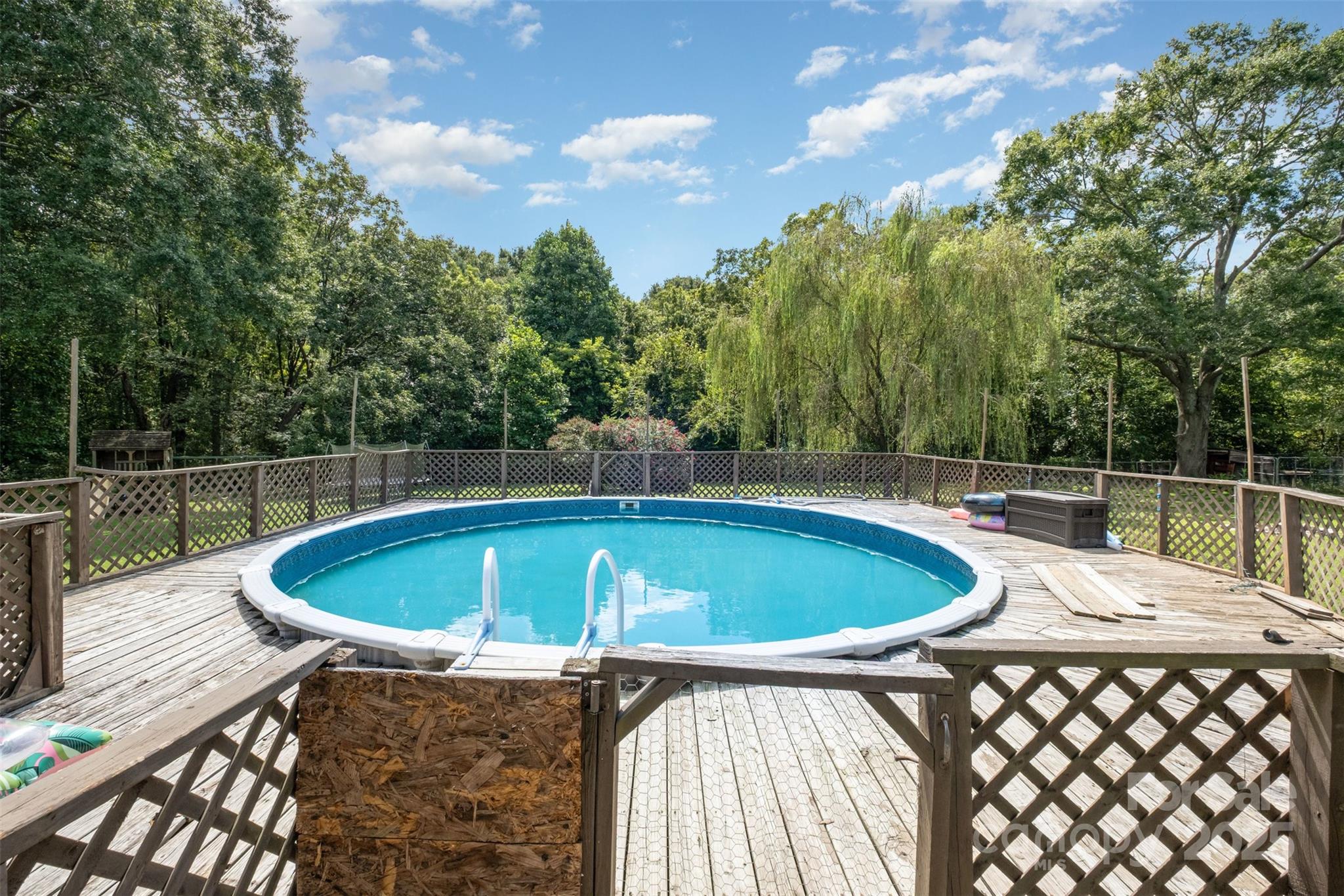 811 Cleveland Avenue Grover, NC 28073 - Photo 28 of 43 a view of a swimming pool with a patio