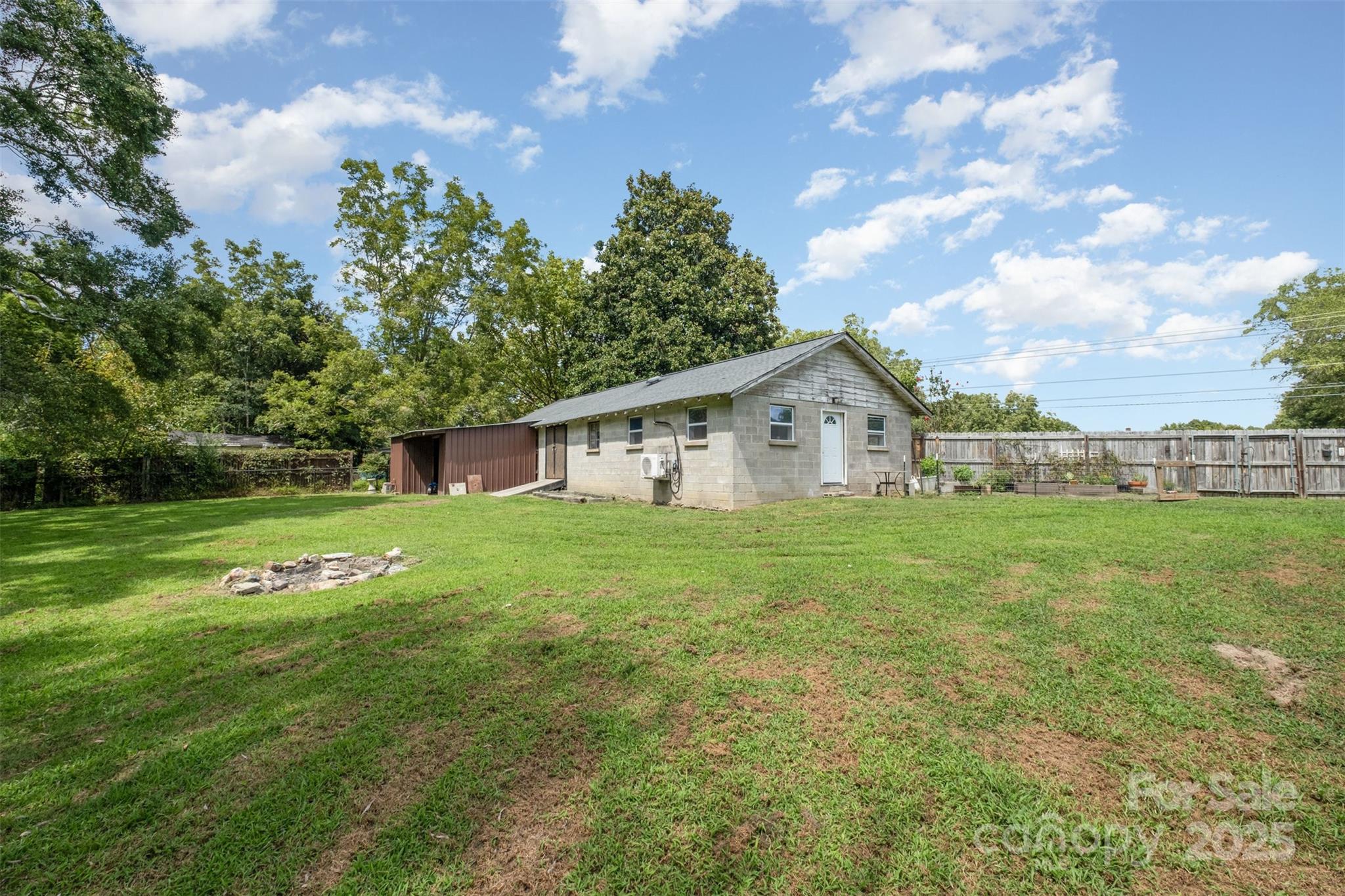 811 Cleveland Avenue Grover, NC 28073 - Photo 30 of 43 a view of a house with backyard and garden