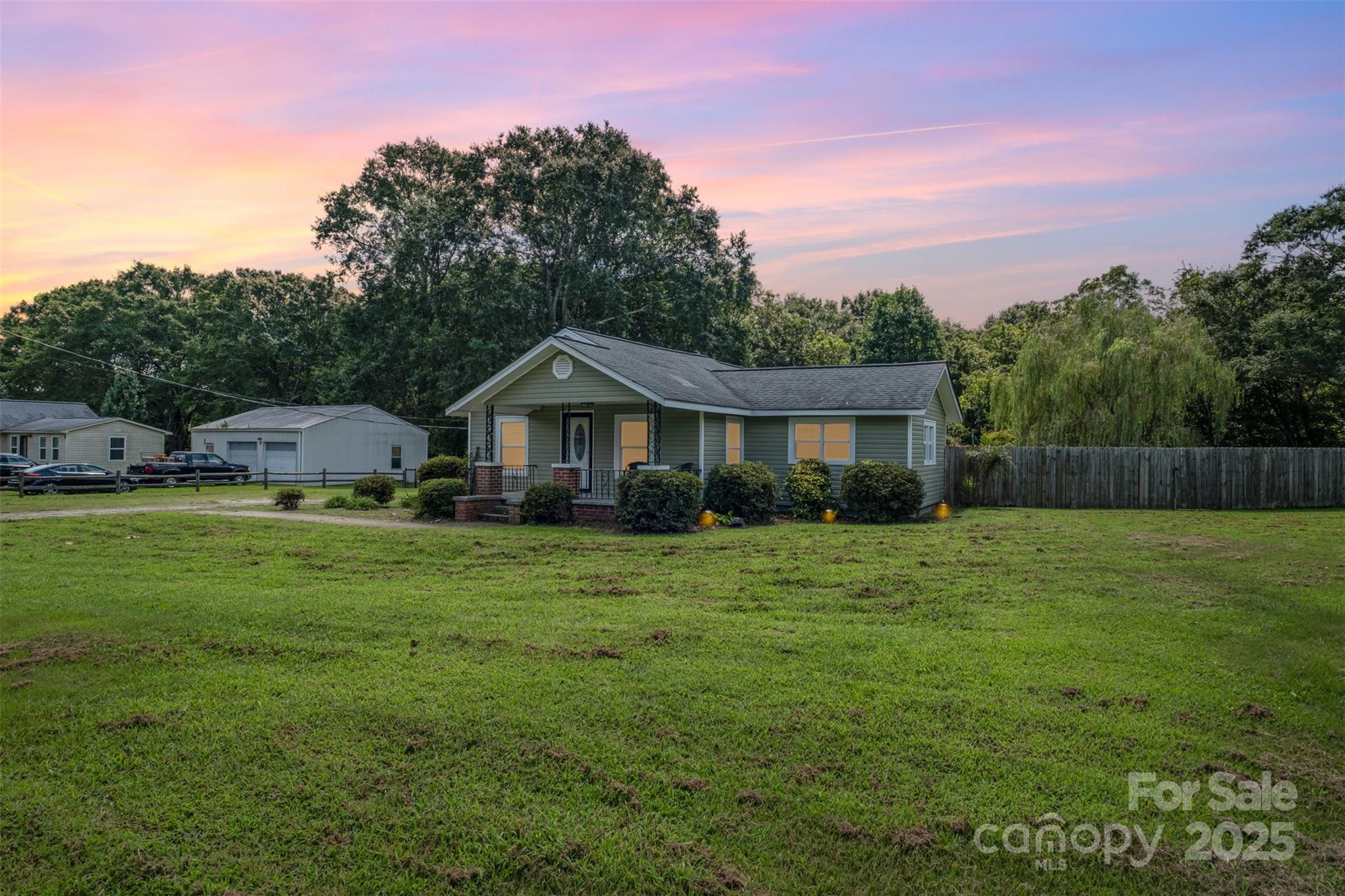 811 Cleveland Avenue Grover, NC 28073 - Photo 3 of 43 a front view of a house with a yard and trees