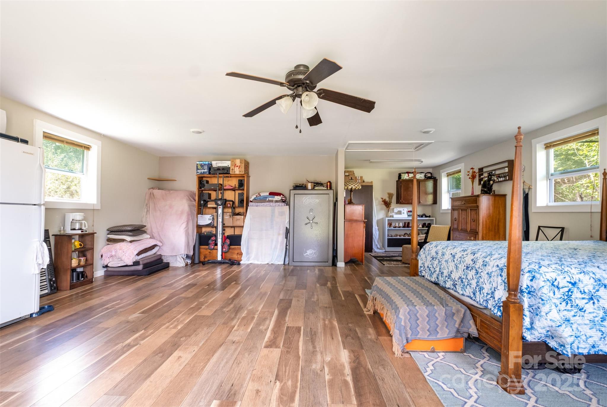 811 Cleveland Avenue Grover, NC 28073 - Photo 32 of 43 a living room with furniture and a wooden floor