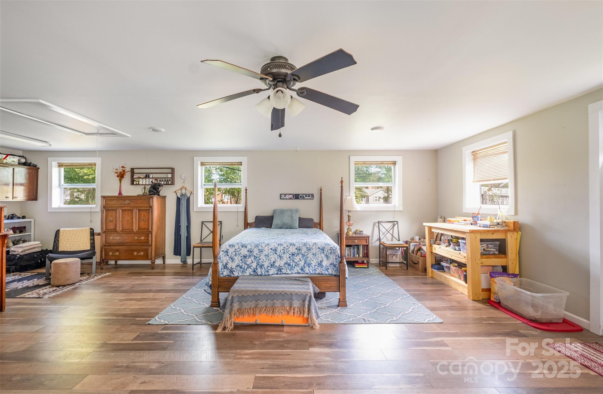 811 Cleveland Avenue Grover, NC 28073 - Photo 35 of 43 a living room with furniture and a wooden floor