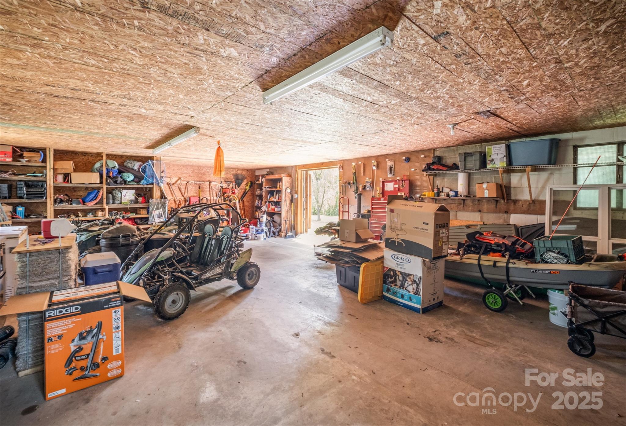 811 Cleveland Avenue Grover, NC 28073 - Photo 38 of 43 a view of a storage area with lots of stuff