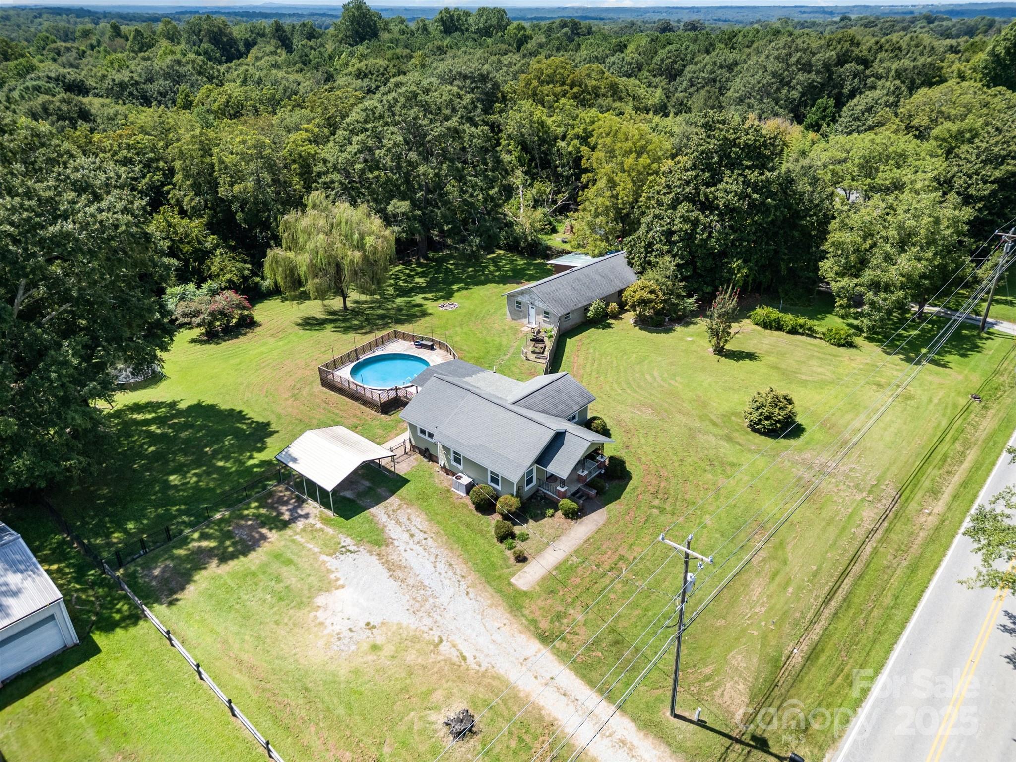 811 Cleveland Avenue Grover, NC 28073 - Photo 40 of 43 an aerial view of a swimming pool