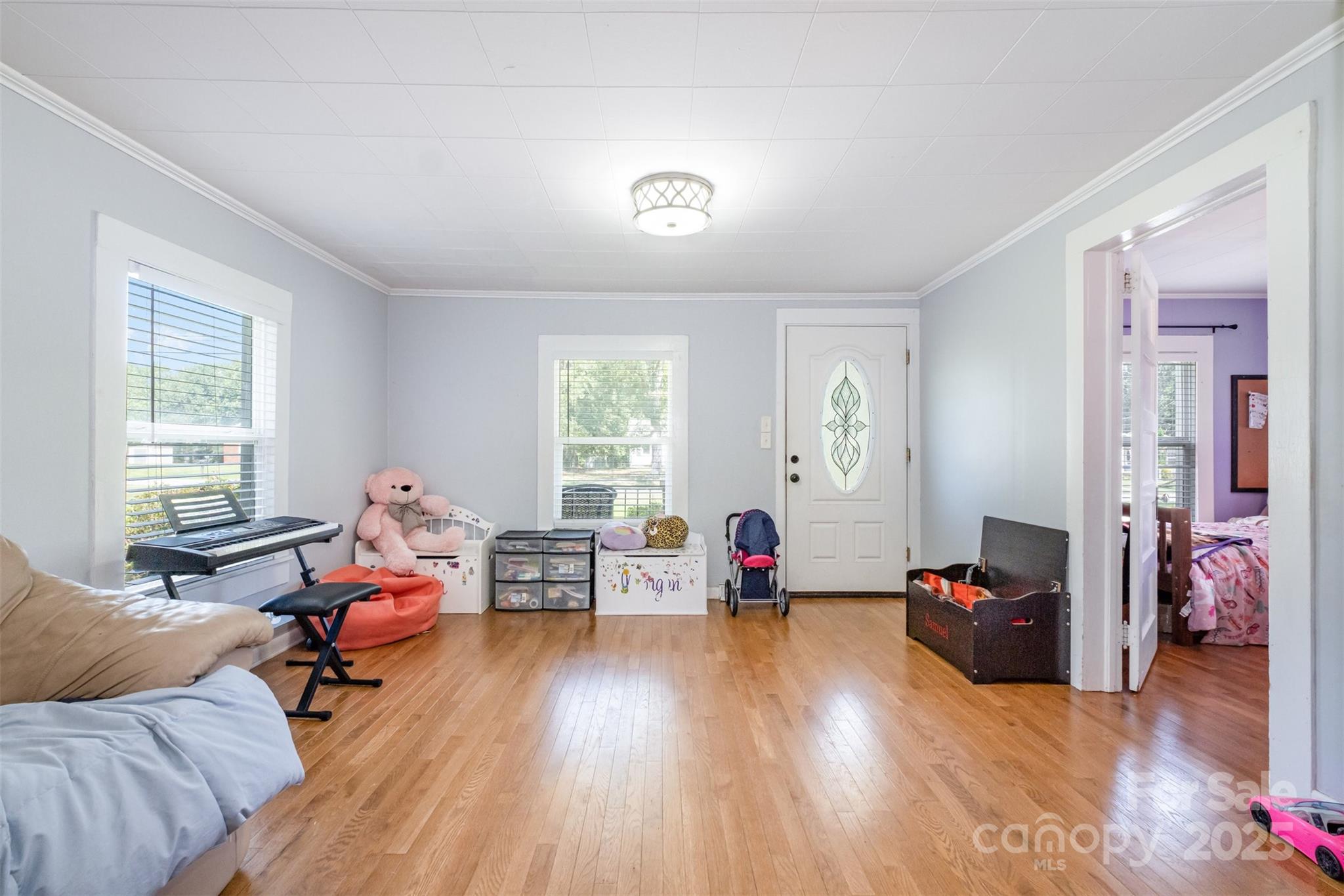 811 Cleveland Avenue Grover, NC 28073 - Photo 6 of 43 a living room with furniture and wooden floor