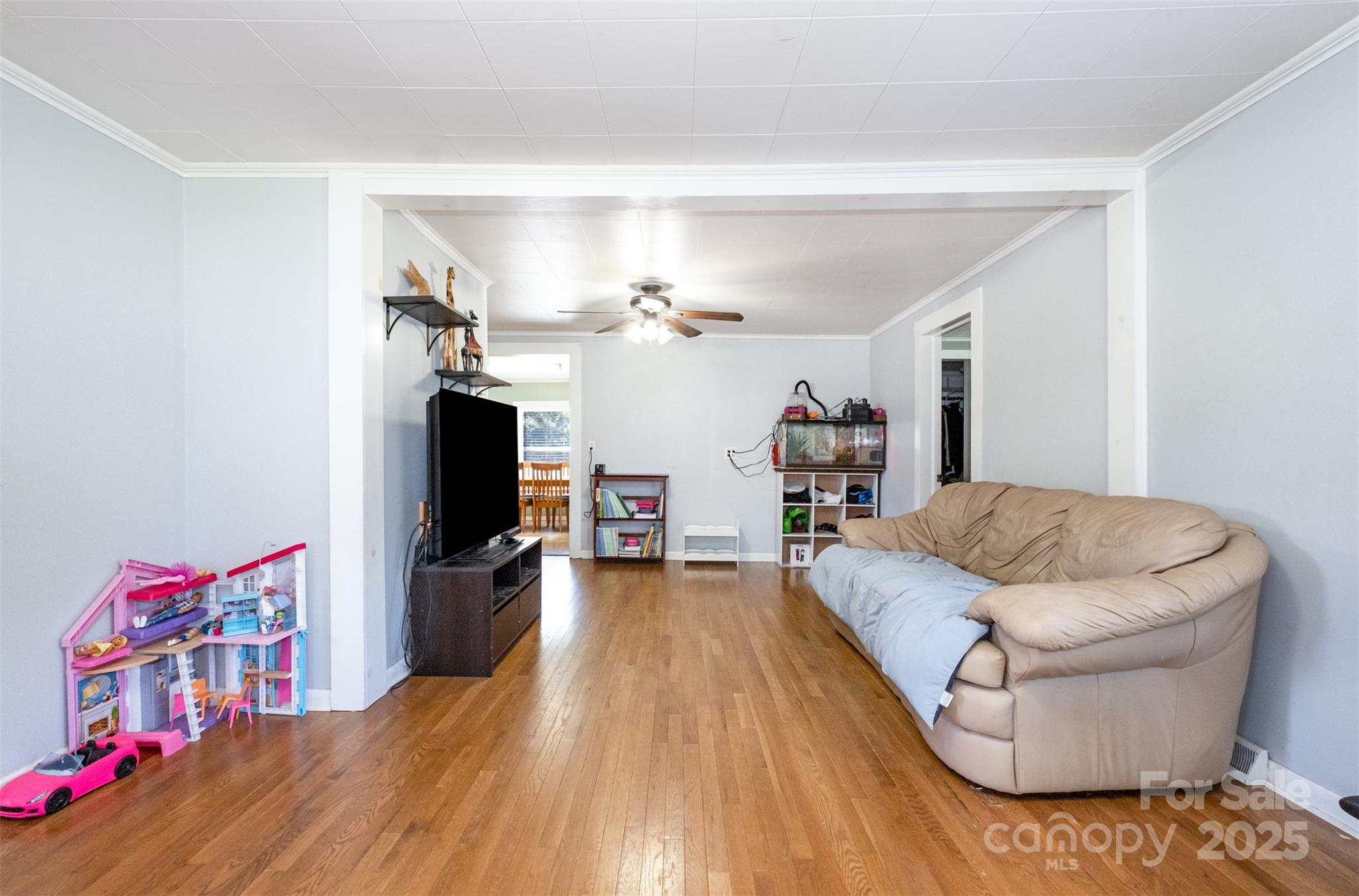 811 Cleveland Avenue Grover, NC 28073 - Photo 7 of 43 a living room with furniture and a flat screen tv
