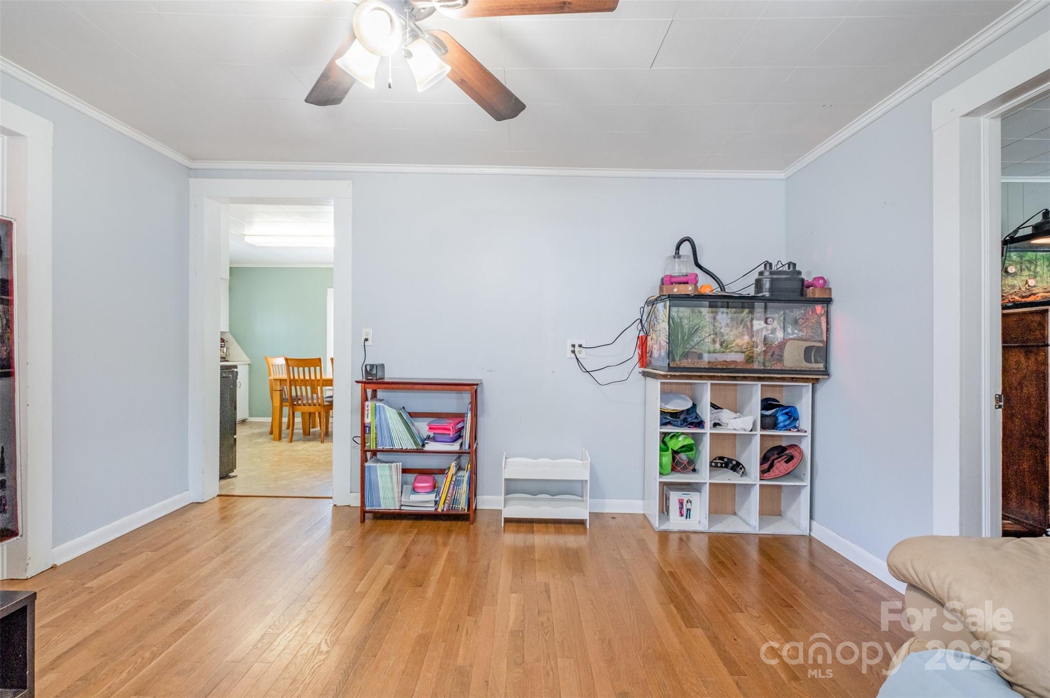 811 Cleveland Avenue Grover, NC 28073 - Photo 9 of 43 a living room with furniture and a book shelf