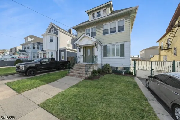 a house view with a garden space