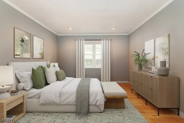 a bedroom with a large bed and a couch