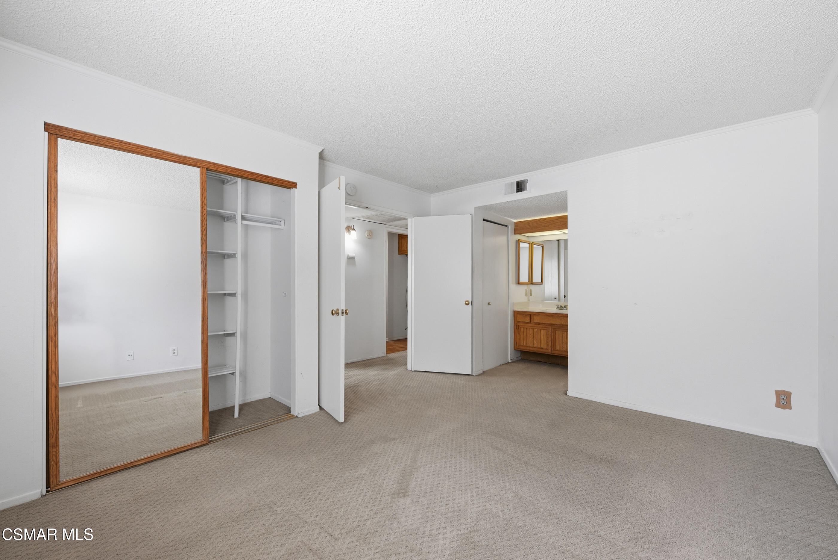 20342 Rue Crevier, Unit 613 Canyon Country, CA 91351 - Photo 17 of 36 an empty room with closet and a window