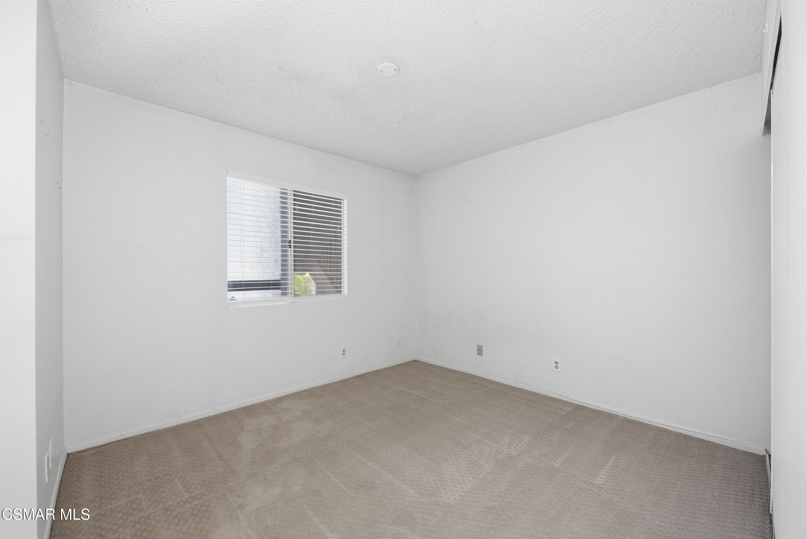 20342 Rue Crevier, Unit 613 Canyon Country, CA 91351 - Photo 20 of 36 an empty room with a window