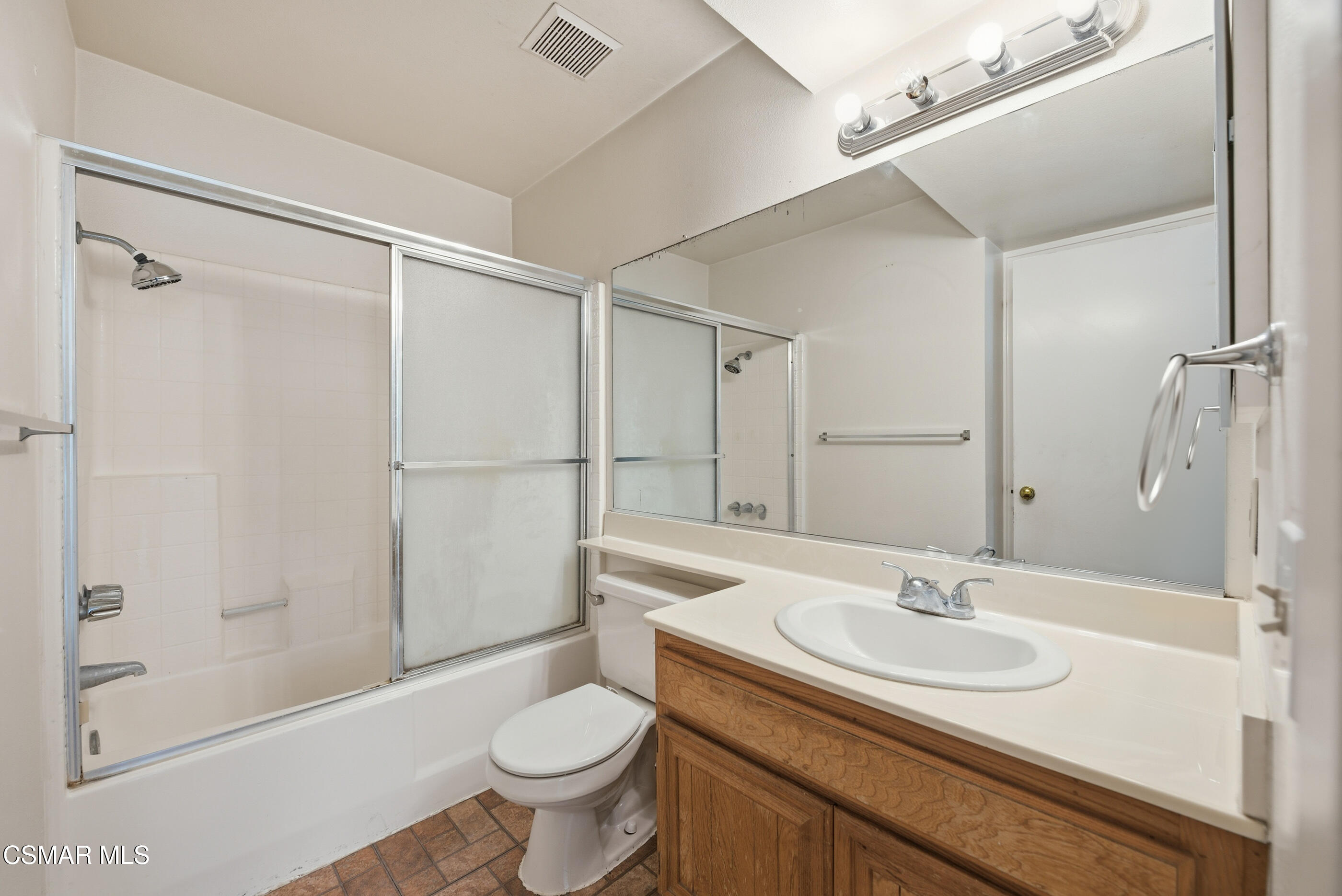 20342 Rue Crevier, Unit 613 Canyon Country, CA 91351 - Photo 21 of 36 a bathroom with a sink toilet and shower