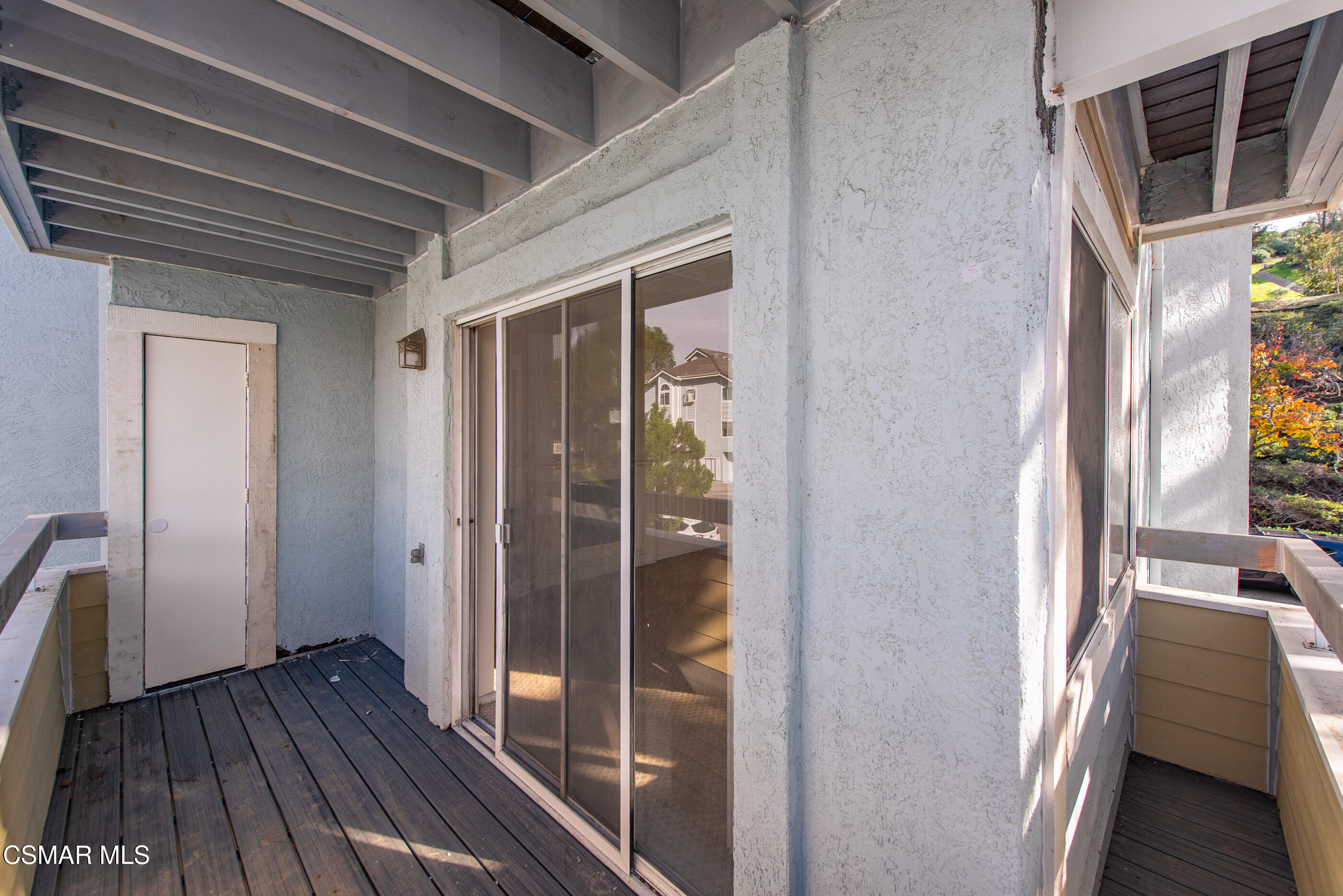 20342 Rue Crevier, Unit 613 Canyon Country, CA 91351 - Photo 24 of 36 a view of a hallway with wooden floor and staircase