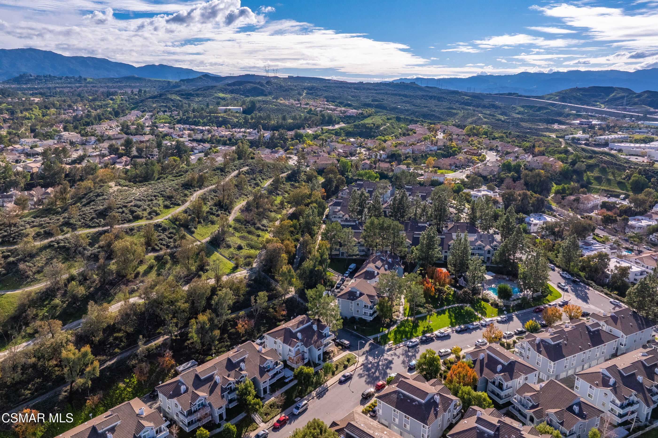 20342 Rue Crevier, Unit 613 Canyon Country, CA 91351 - Photo 31 of 36 an aerial view of residential houses with outdoor space