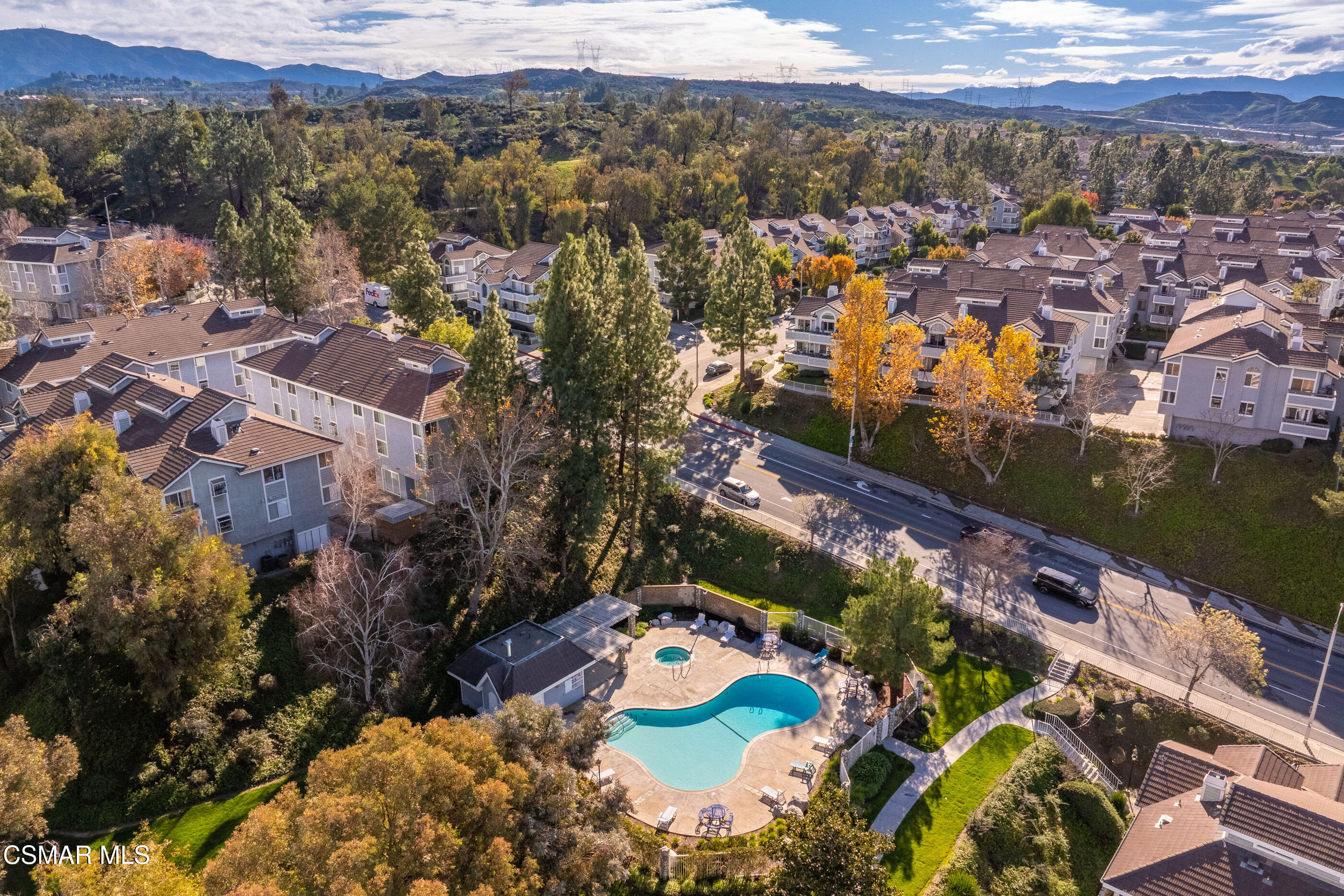 20342 Rue Crevier, Unit 613 Canyon Country, CA 91351 - Photo 33 of 36 an aerial view of residential houses with outdoor space