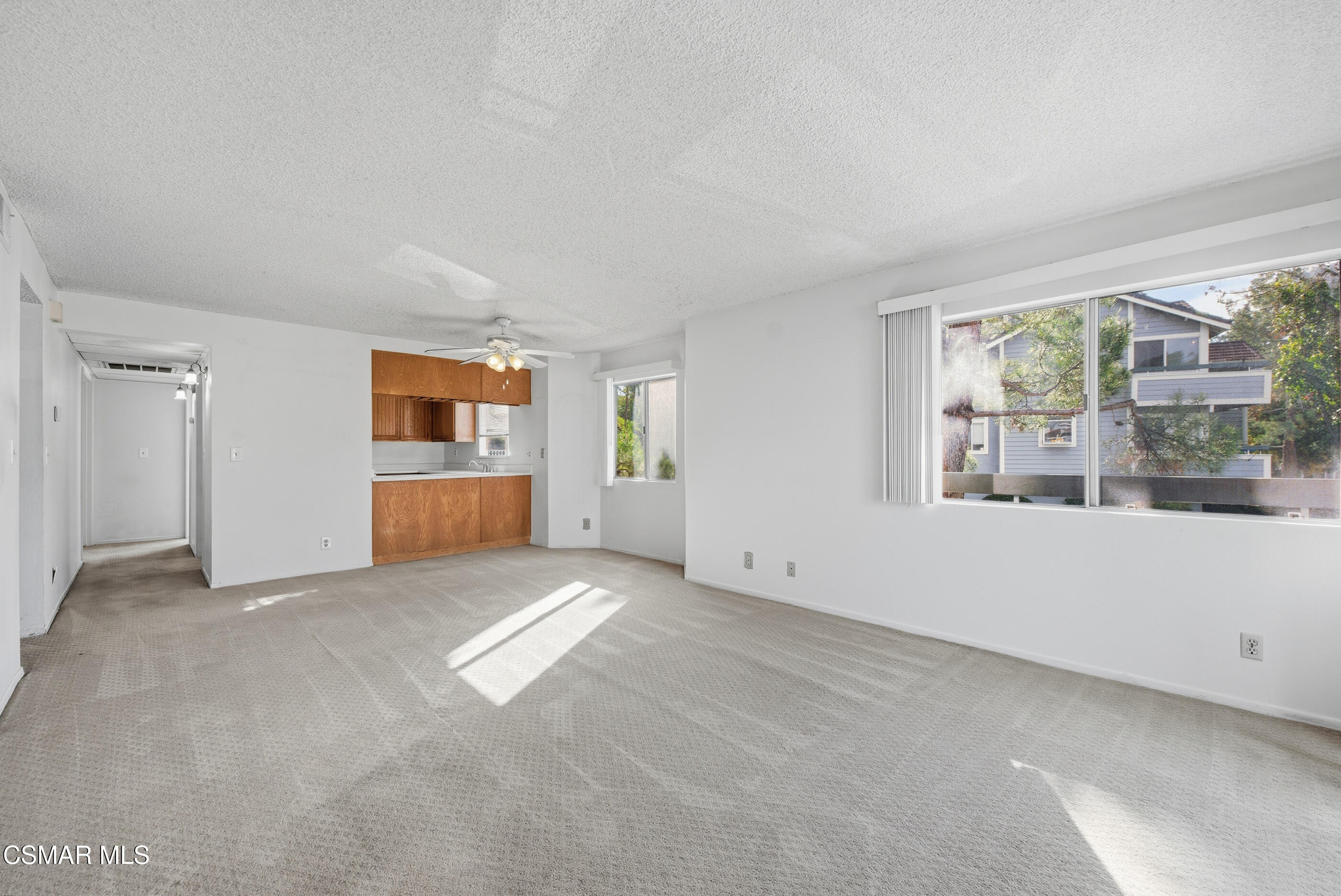 20342 Rue Crevier, Unit 613 Canyon Country, CA 91351 - Photo 7 of 36 an empty room with windows and an empty room