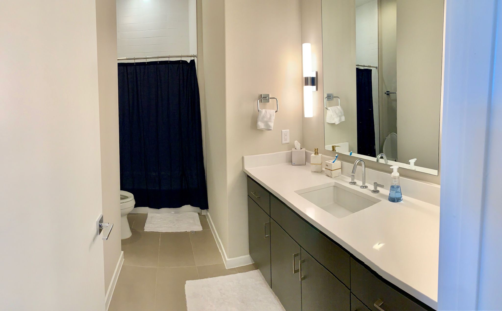5921 Hiline Road, Unit 2304 Austin, TX 78734 - Photo 29 of 38 Full bathroom featuring vanity, light tile patterned floors, and a shower with shower curtain