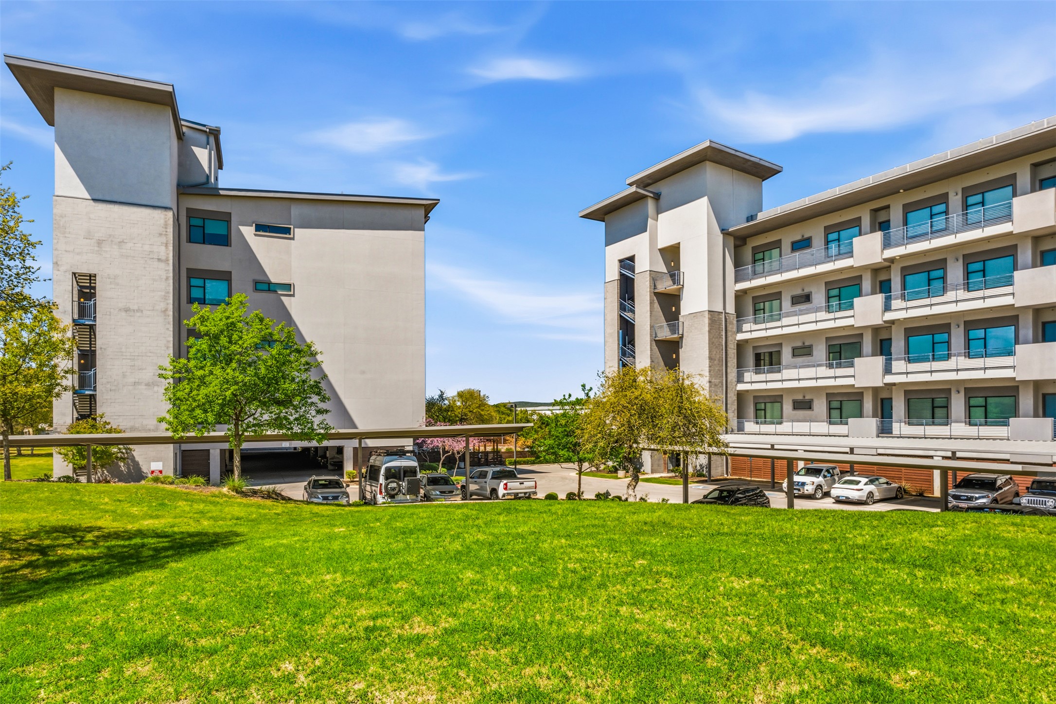 5921 Hiline Road, Unit 2304 Austin, TX 78734 - Photo 34 of 38 a front view of a house with a yard