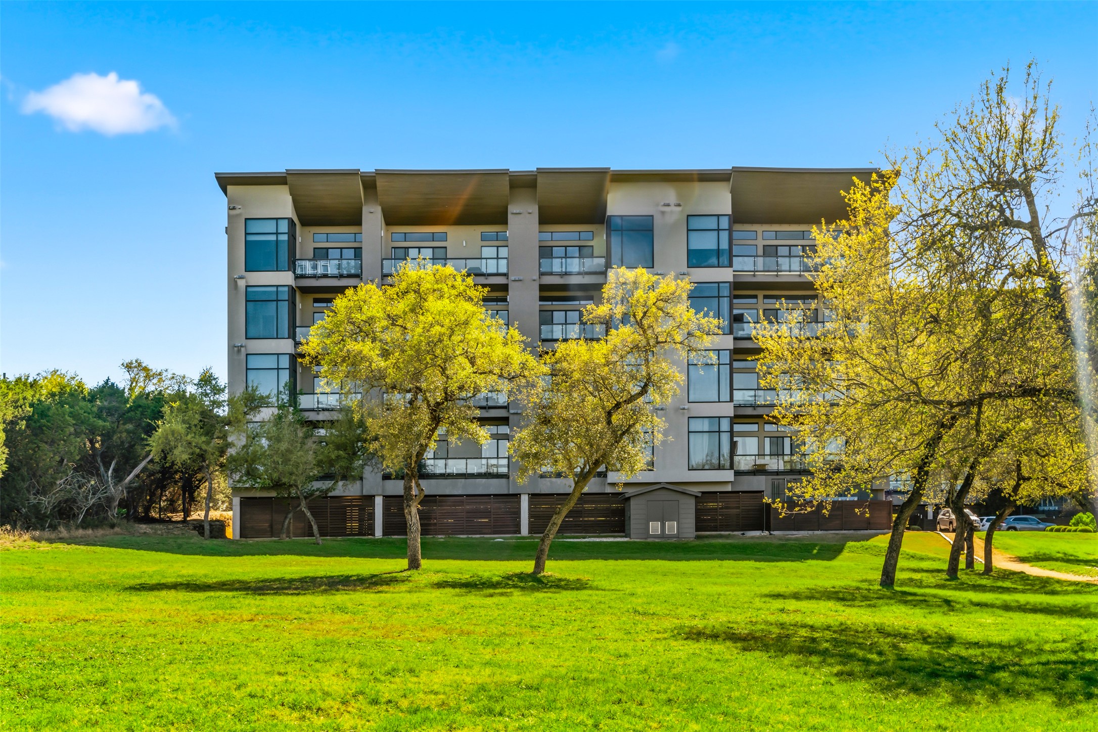 5921 Hiline Road, Unit 2304 Austin, TX 78734 - Photo 36 of 38 a front view of building with yard