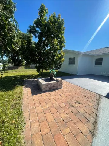 a swimming pool view with a outdoor space