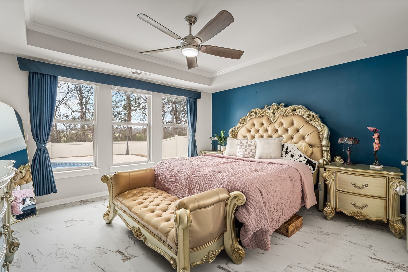 1413 Burrows Avenue Murfreesboro, TN 37129 - Photo 22 of 45 a spacious bedroom with a bed and a chandelier