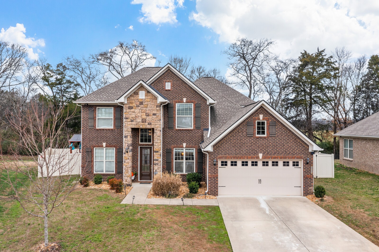 1413 Burrows Avenue Murfreesboro, TN 37129 - Photo 3 of 45 front view of a house with a yard