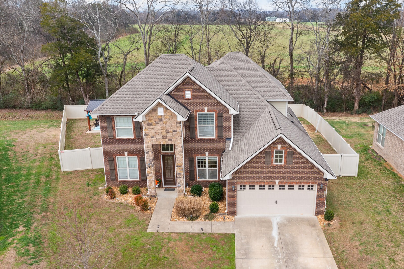 1413 Burrows Avenue Murfreesboro, TN 37129 - Photo 44 of 45 a front view of a house with a yard