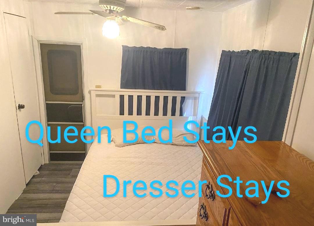 111 Beach Harbor Road Grasonville, MD 21638 - Photo 3 of 15 a view of outdoor space with a table and chairs