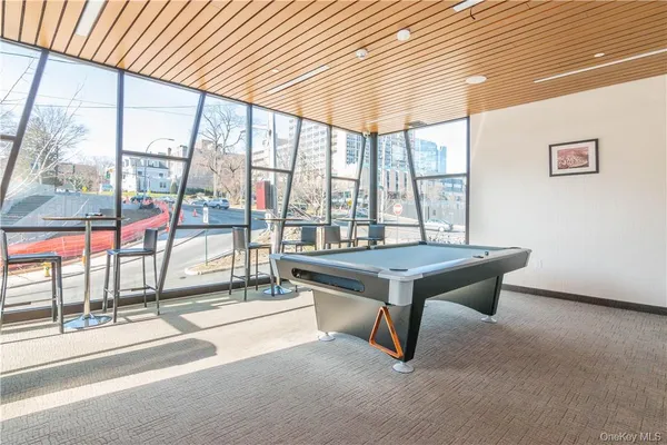 a living room with large windows