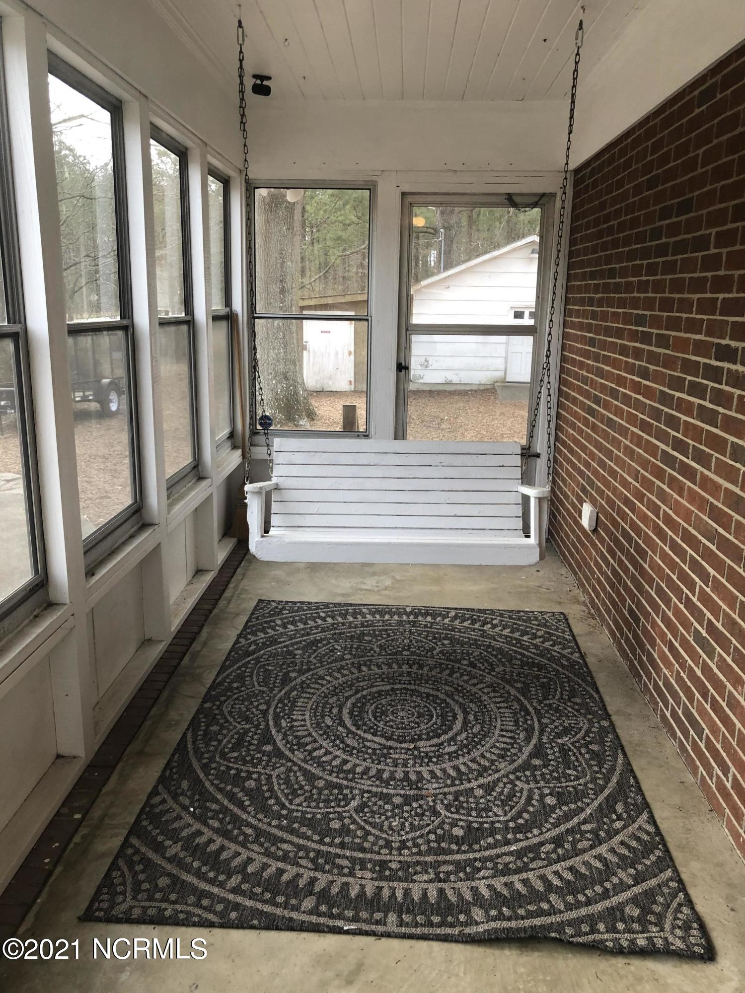1710 Holly Ridge Road Kinston, NC 28504 - Photo 4 of 13 Enclosed Side Porch