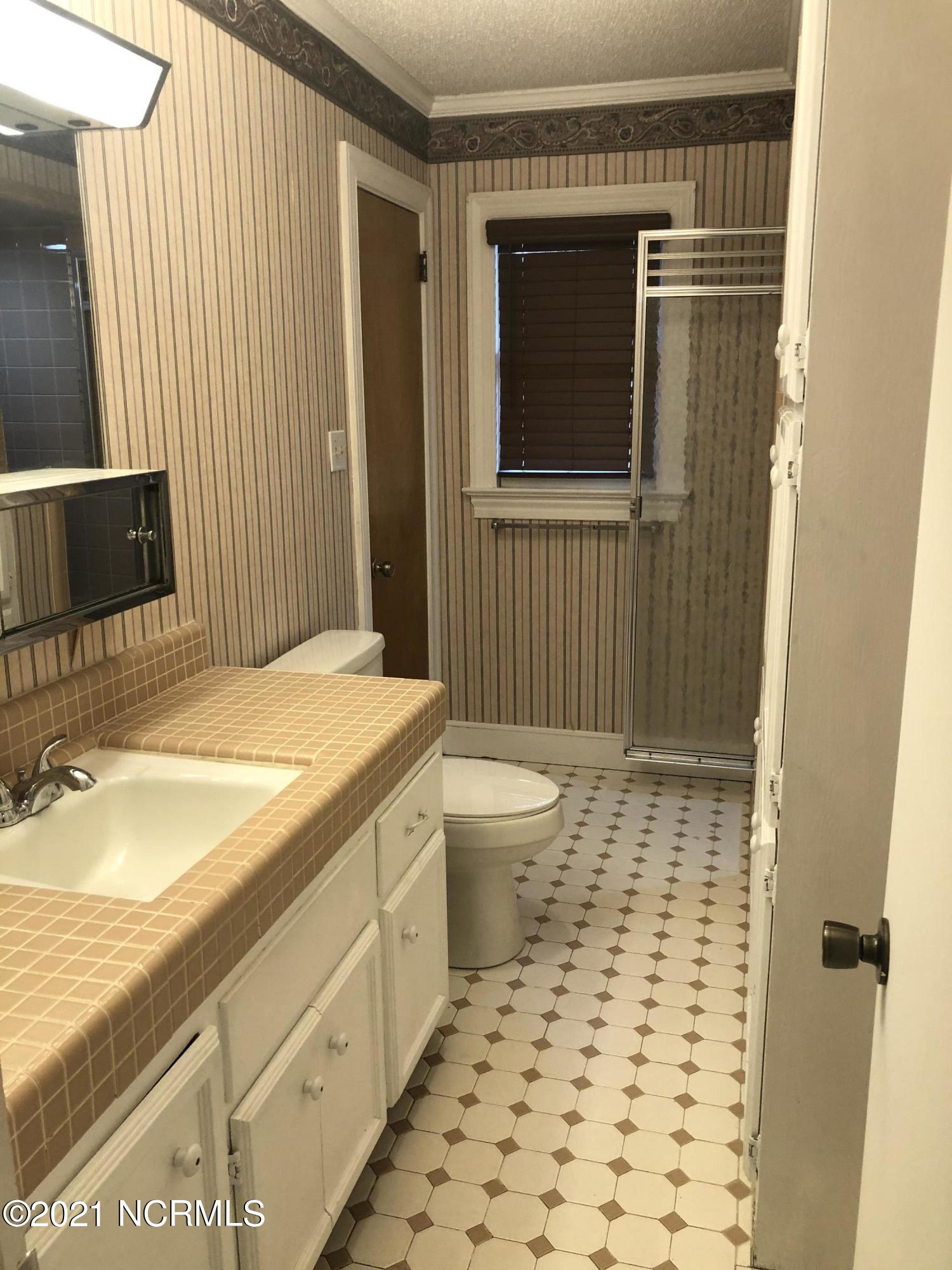 1710 Holly Ridge Road Kinston, NC 28504 - Photo 9 of 13 Tiles Bathroom w/Tile Shower