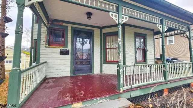 a view of a house with a porch