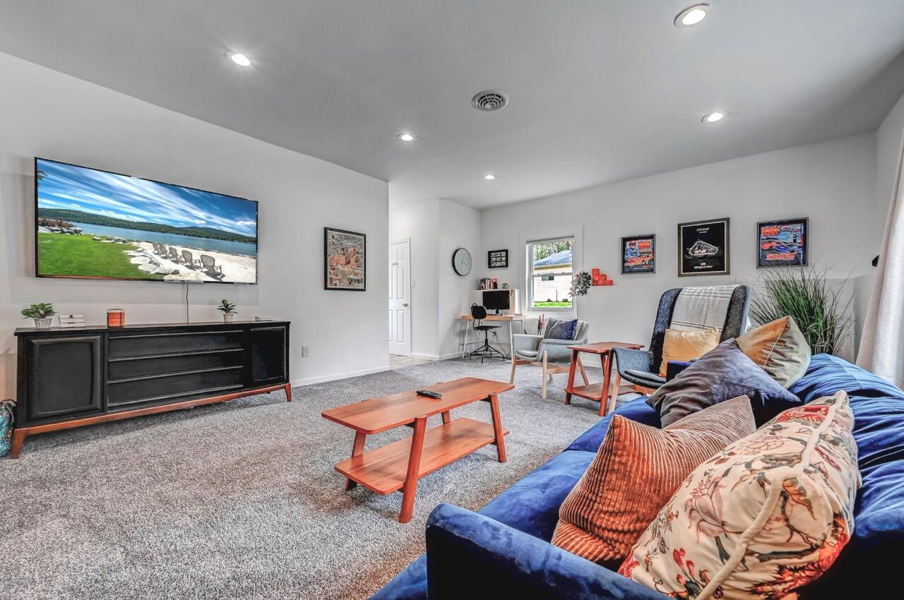 134 Altemose Road Pocono Lake, PA 18347 - Photo 10 of 48 a living room with furniture and a flat screen tv