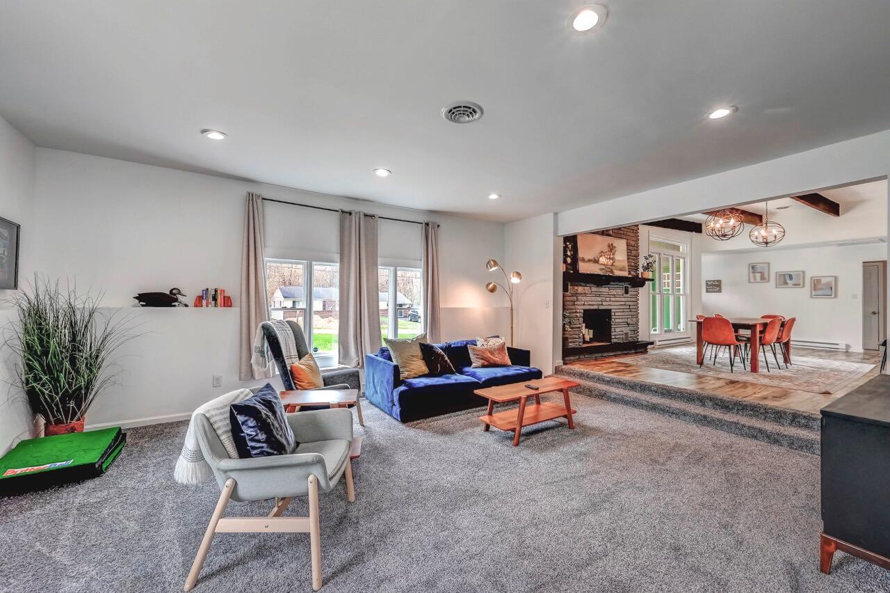 134 Altemose Road Pocono Lake, PA 18347 - Photo 15 of 48 a living room with furniture and a flat screen tv