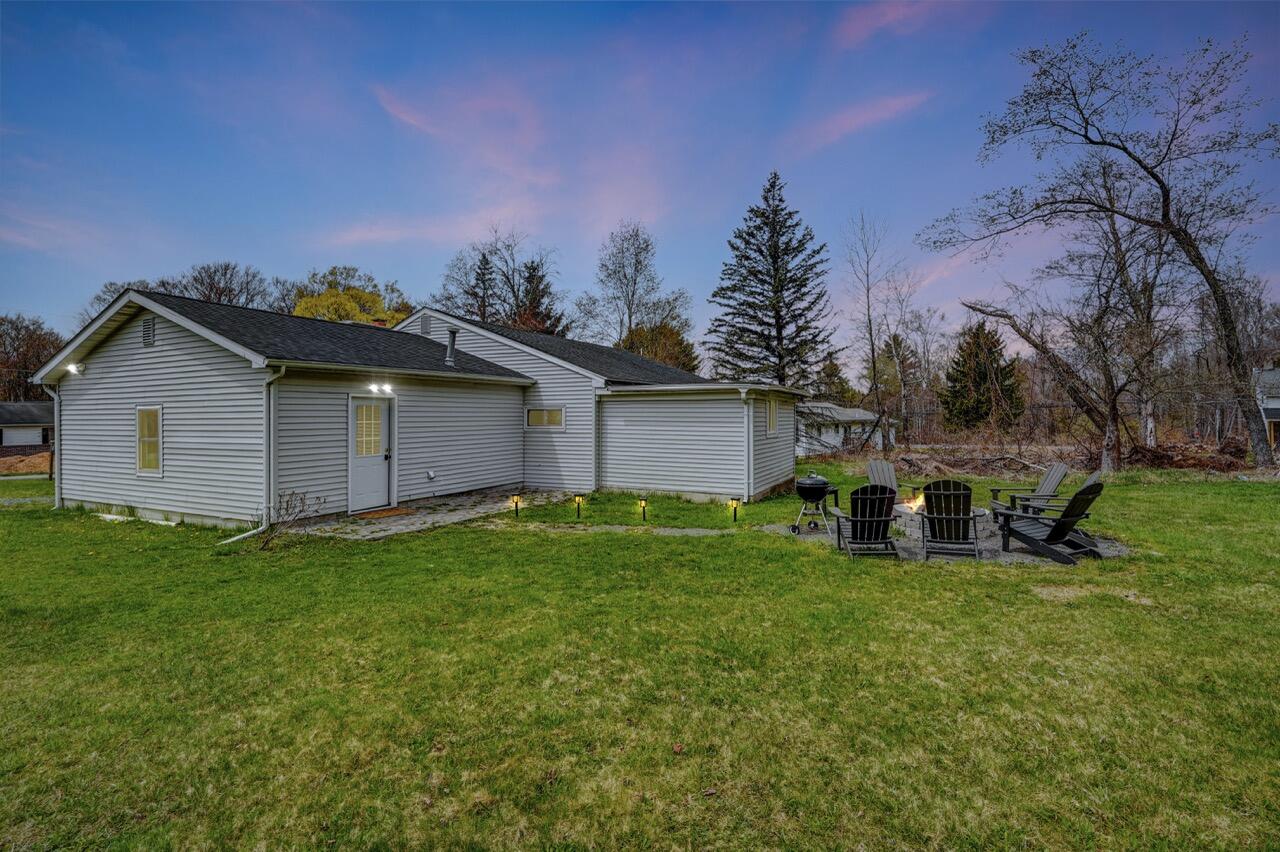 134 Altemose Road Pocono Lake, PA 18347 - Photo 3 of 48 a view of a backyard with plants and a large tree